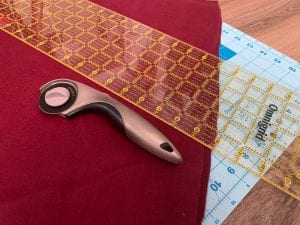 Cutting fabric - much easier with a rotary cutter!